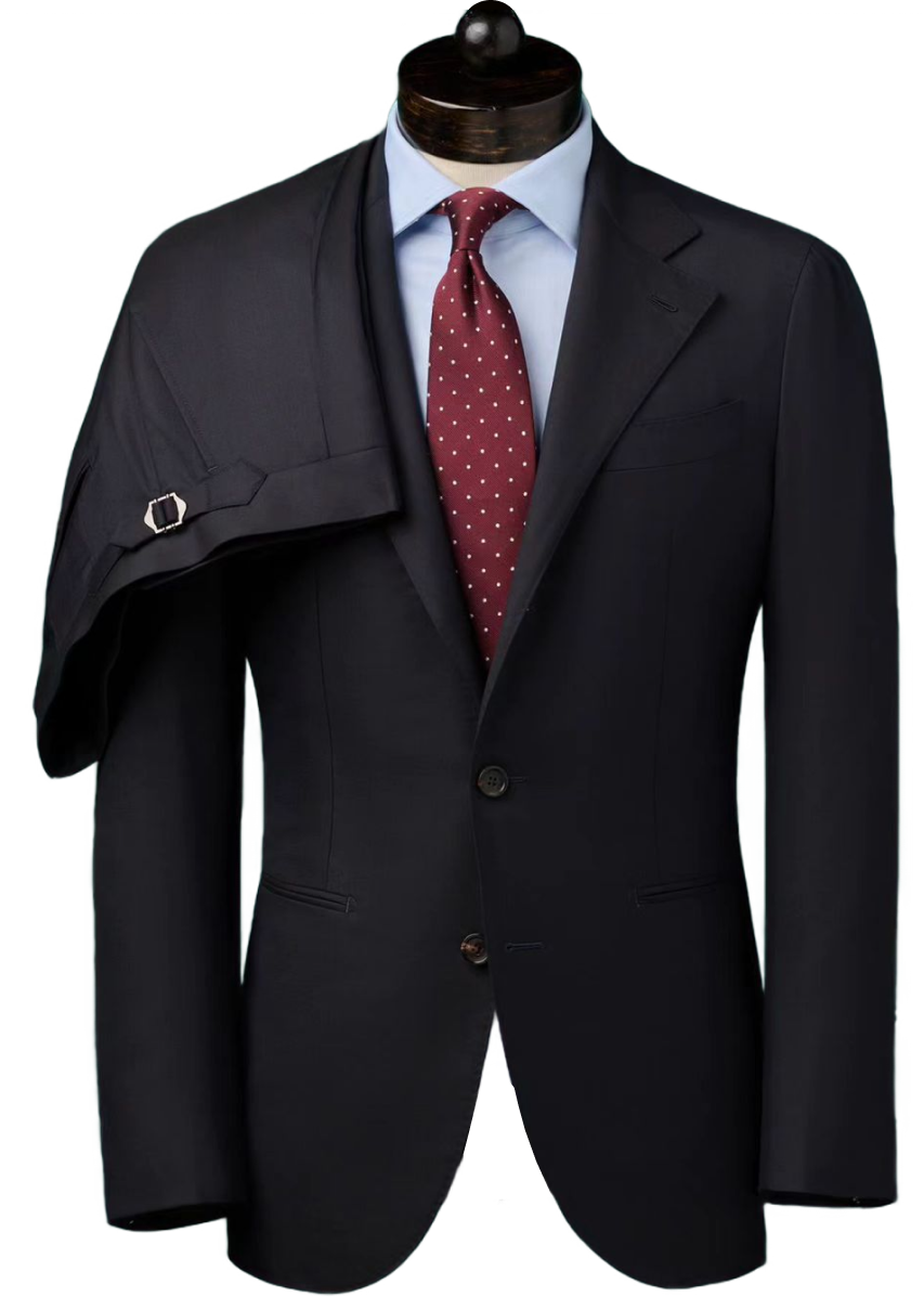 Grey double-breasted suit on a mannequin with a white shirt and red dotted tie