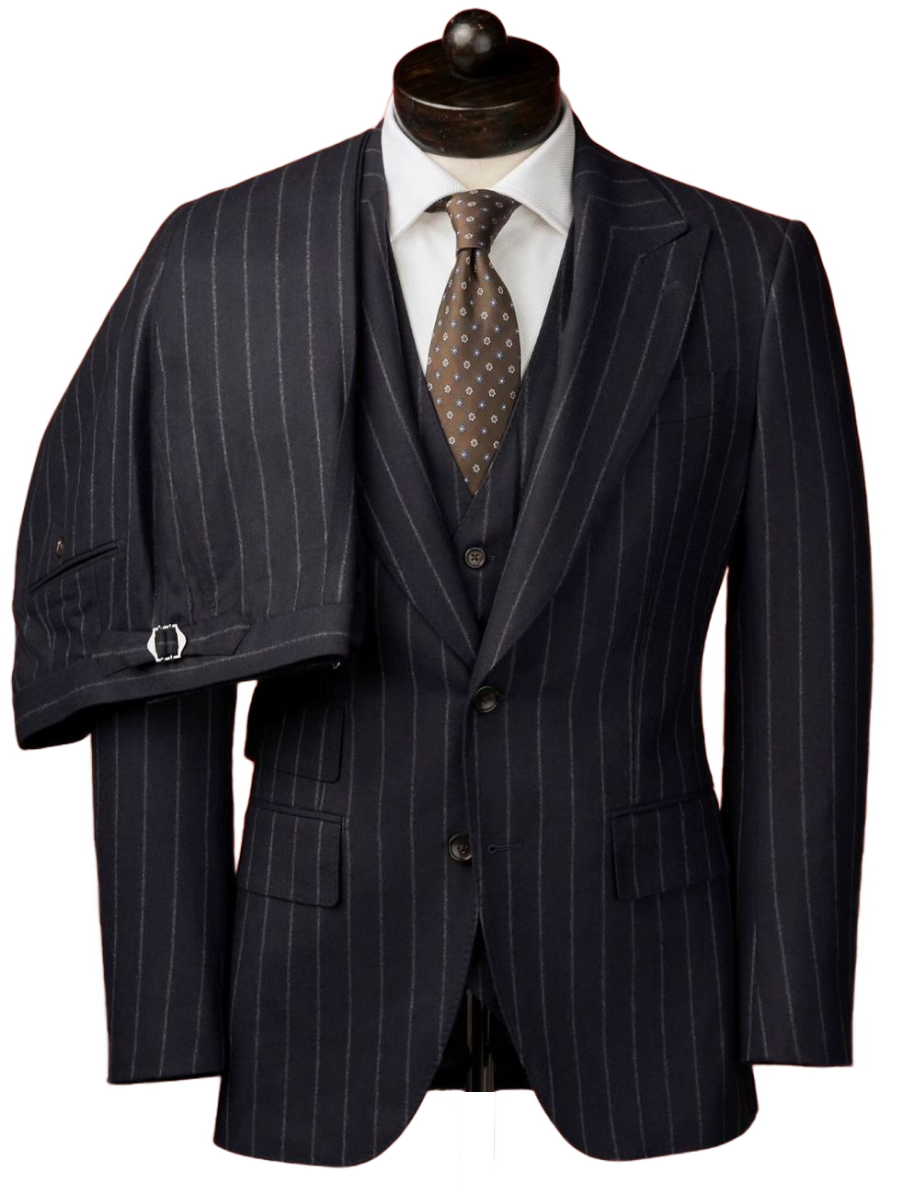 Grey double-breasted suit on a mannequin with a white shirt and red dotted tie
